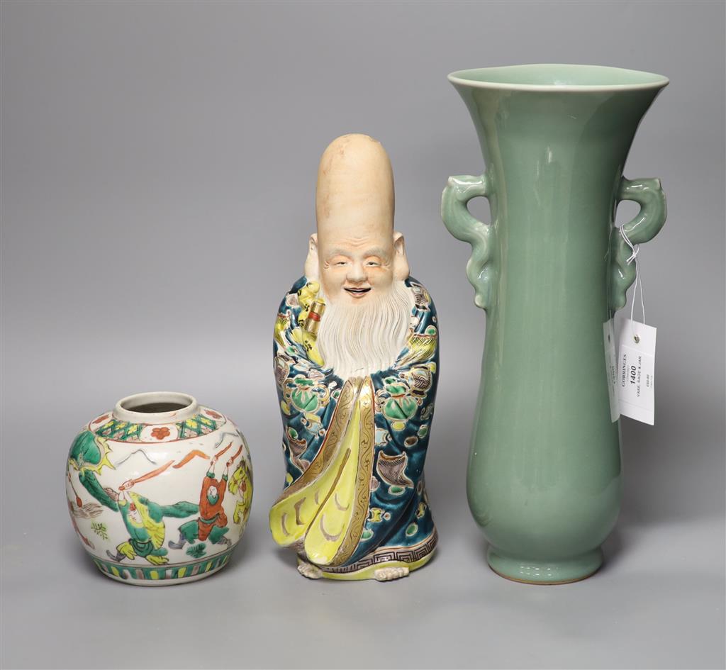 A Chinese celadon vase, a porcelain sage, height 31cm, and a ginger jar